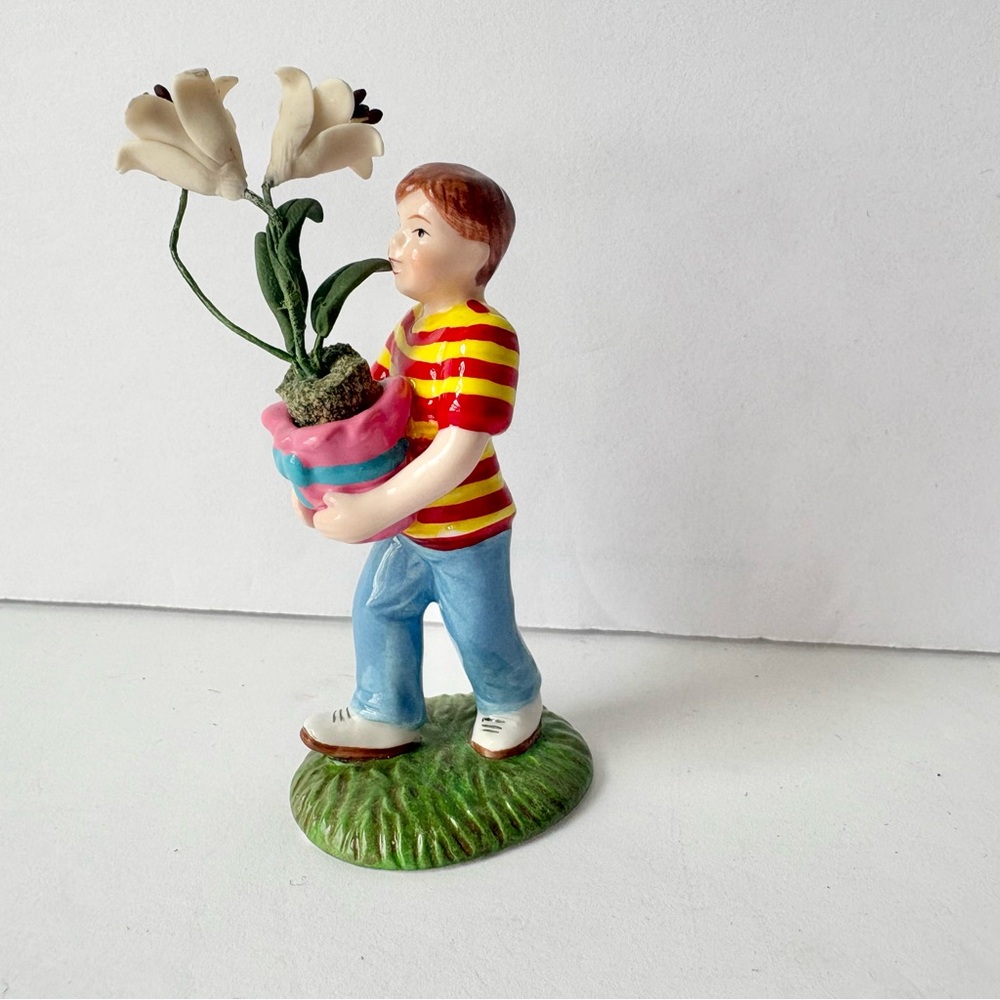 Department 56 Snow Village Boy Carrying Easter Lily Flowers Porcelain Fi…